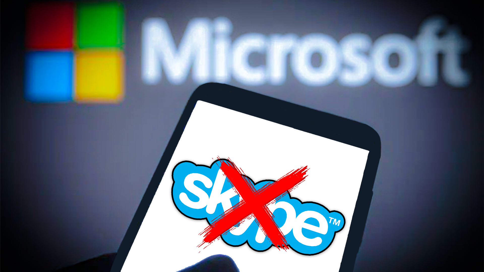unseen person holding a phone with the skype shutdown news logo on the screen with a red x over it and a large microsoft in the background blurred