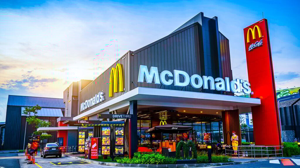mcdonalds restaurant with drive thru and seating with ronald mcdonald statue surrounding the mcdonald's password leak