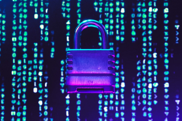 purple cybersecurity padlock surrounded by code numbers