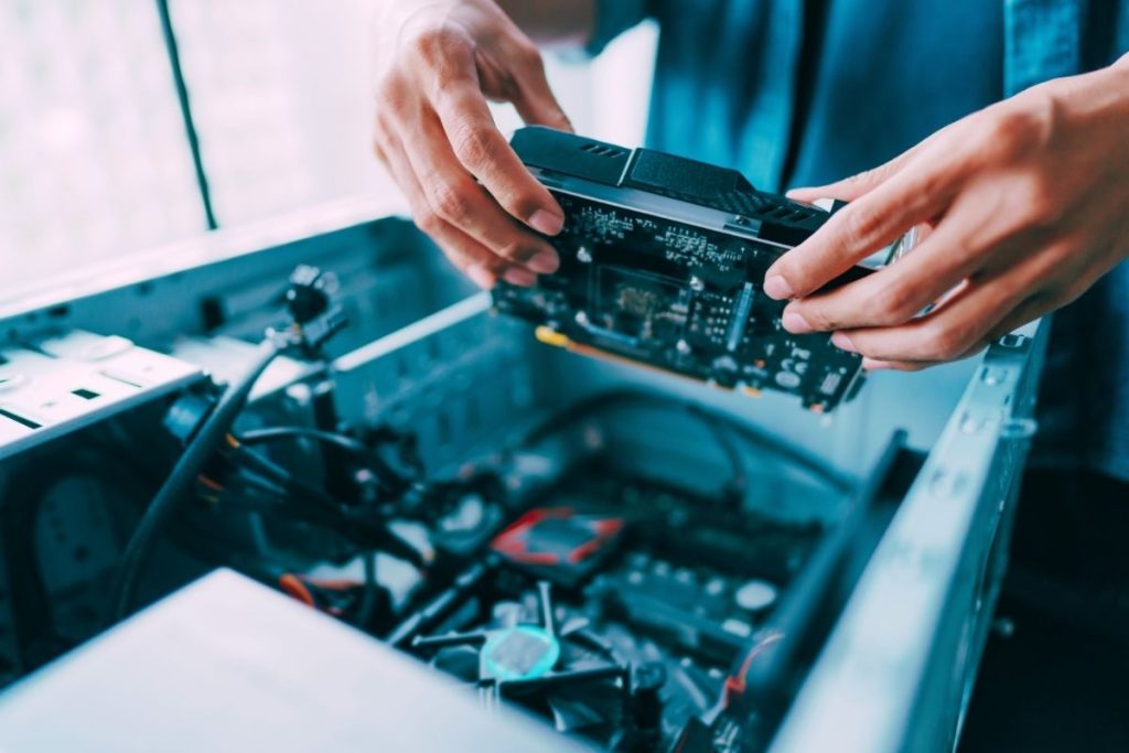 IT Support technician changing PC parts and hardware