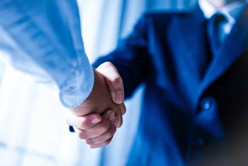 business people shaking hands