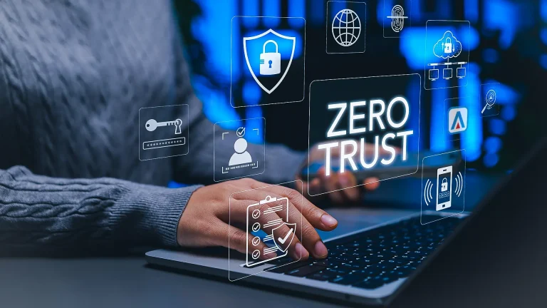 zero-trust cybersecurity person typing on a laptop with padlock user settings security and cloud fingerprint icons surrounding